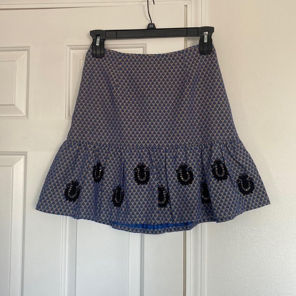 Anthropologie Leifsdottir mini skirt with ruffled bottom.